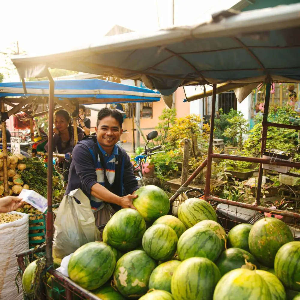 smiling filipino at the market
